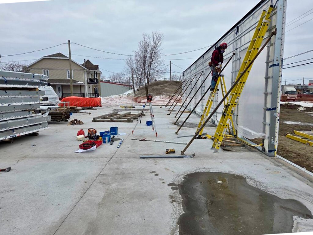 Formation continue sur les chantiers : structure de murs en acier préfabriqués, condos à Saint-Henri – MSC Construction